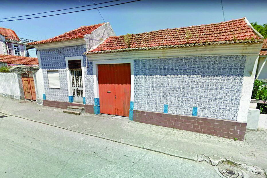 Casa onde ocorreu o crime, na Costa do Valado, em Oliveirinha. A mulher não tinha mobilidade e o filho disse às autoridades que a mãe tinha caído da cama