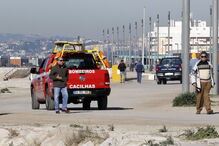 Buscas por bodyboarder na Costa da Caparica