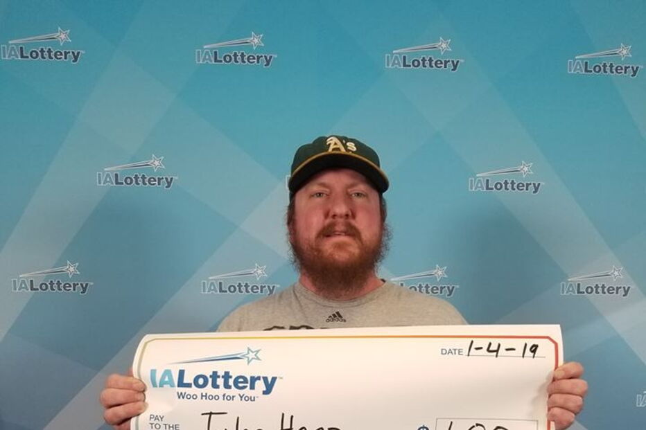 Ganha um dólar na lotaria mas quis ser pago com cheque gigante