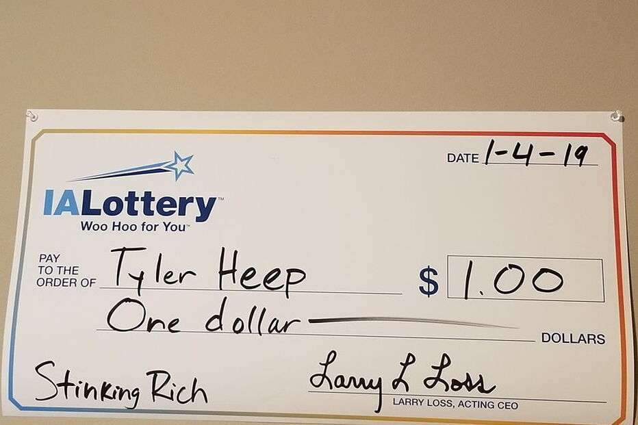 Ganha um dólar na lotaria mas quis ser pago com cheque gigante