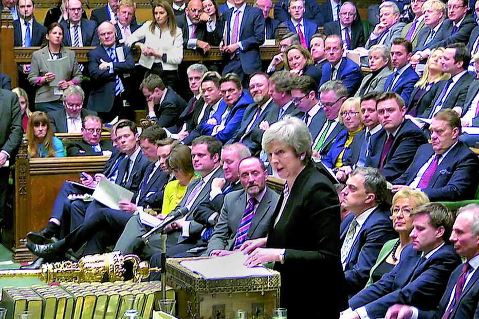 May apoiou uma alteração ao acordo que ela mesma assinou com Bruxelas, no sentido de obter apoio parlamentar para renegociar com a União Europeia 