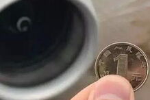 Passageiro detido após ser apanhado a atirar moedas ao motor do avião para 