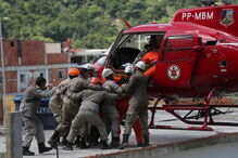 Bombeiros resgatam vítimas dos escombros no Rio de Janeiro
