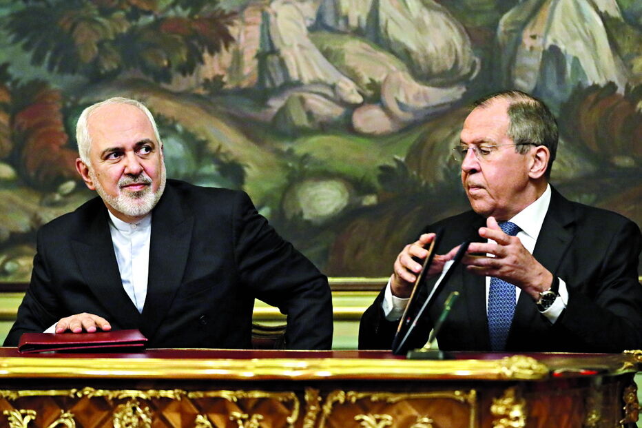 O chefe da diplomacia do Irão, Javad Zarif (à esquerda na foto), visitou Moscovo para explicar a decisão iraniana 