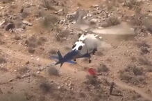 Pior resgate de helicóptero de sempre? Maca que transporta mulher gira a grande velocidade