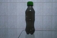 Partículas de fumo fazem cair chuva de água preta em São Paulo