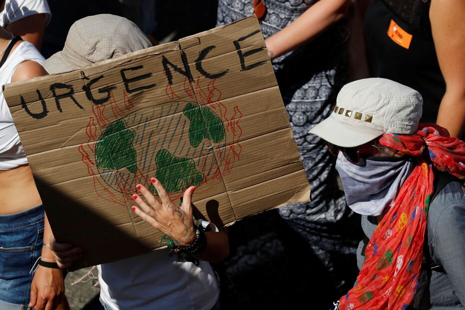 Manifestantes em protestos contra a Cimeira do G7