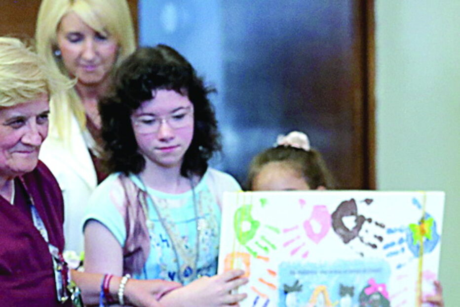 Ministra com pequenos doentes oncológicos 