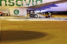 Incêndio no trem traseiro de avião da Transavia