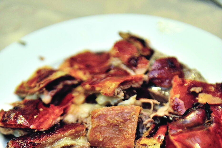 O leitão assado é um clássico da região da Bairrada