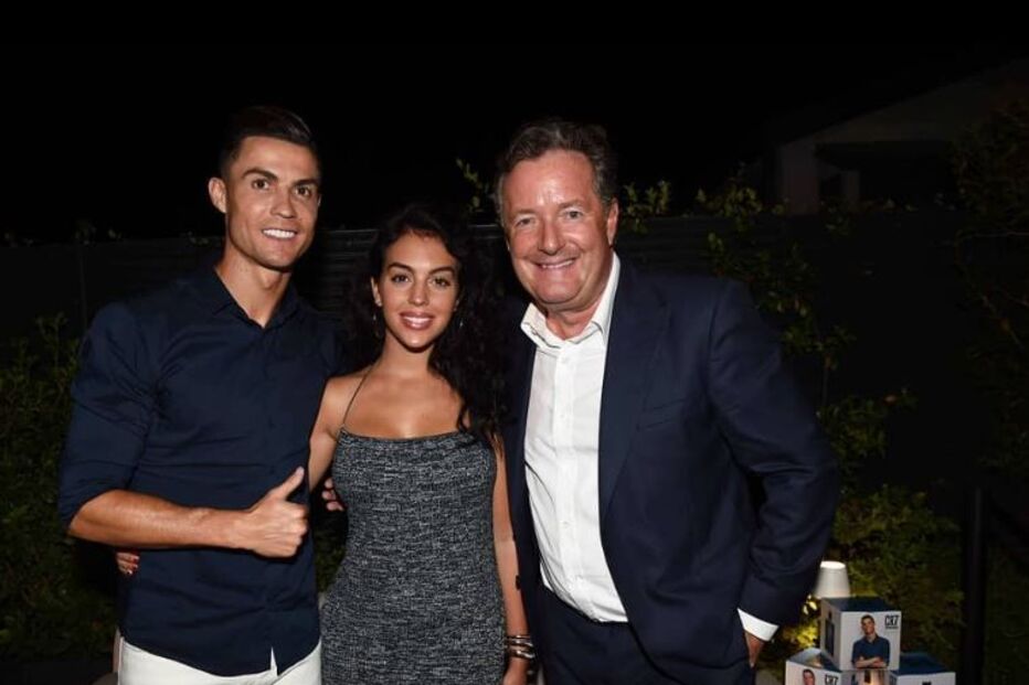 CR7 no final da entrevista, com o apresentador britânico Piers Morgan e com Georgina