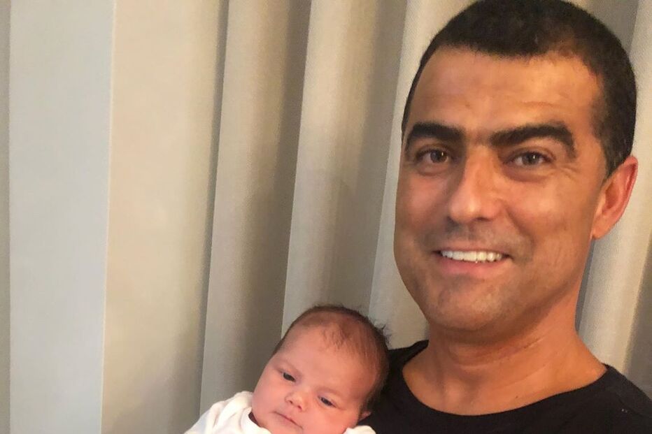 Valentina no colo do irmão de Cristiano Ronaldo, Hugo