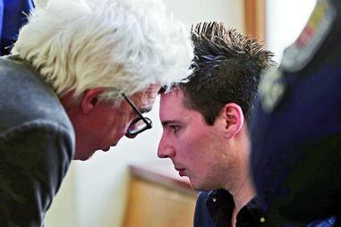 Rui Pinto, na foto com o advogado William Bourdon