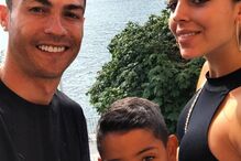 Cristianinho com Cristiano Ronaldo e Georgina