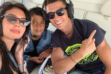 Cristianinho com Cristiano Ronaldo e Georgina