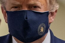Trump aparece de máscara em público