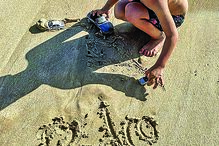 Rui Patrício está com os filhos, Eva e Pedro, e com a mulher, Vera Ribeiro, em Tróia