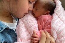 Maria e Caetana, filhas de Cláudia Vieira