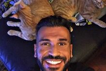 Bruno Savate e os seus dois gatos