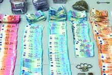 Dinheiro e droga apreendidos pela PSP do Porto ao grupo de traficantes