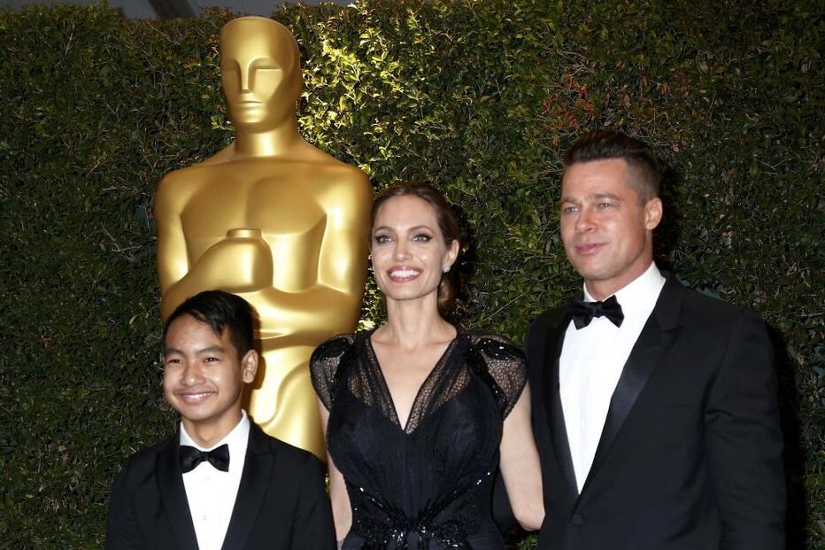 Angelina Jolie com o ex-marido, Brad Pitt, e o filho mais velho, Maddox