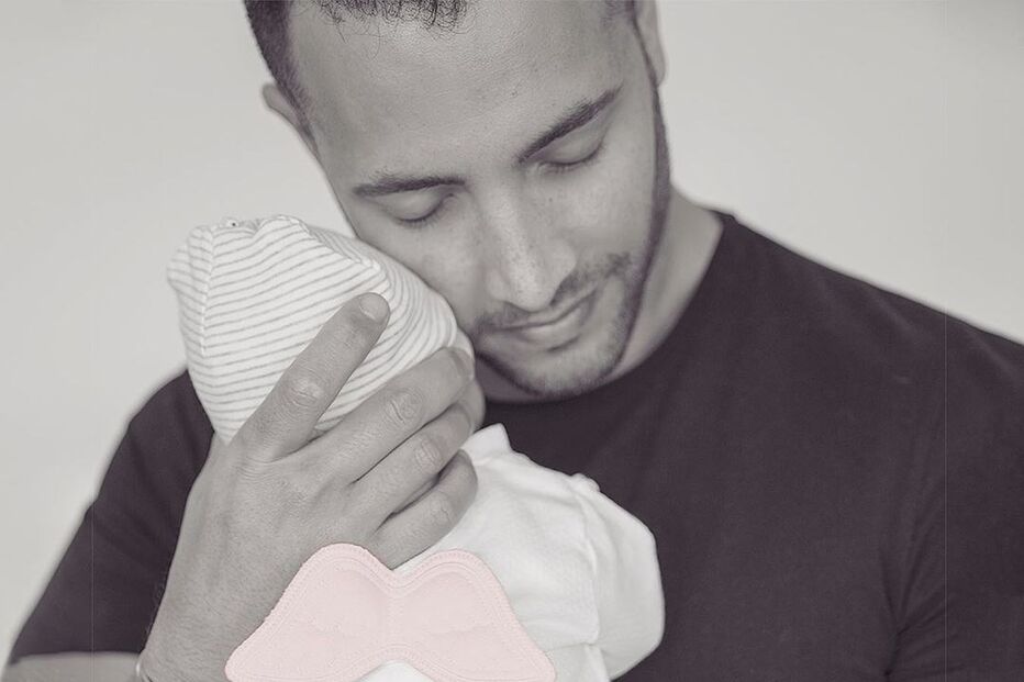 Paulo Teixeira, namorado da Helena Coelho, e a filha, Íris