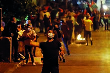 Palestinianos e militares de Israel em noite de confrontos  