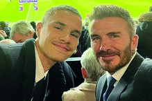 Romeo e David Beckham assistem ao jogo do United