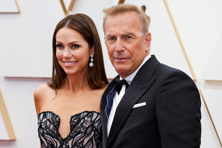 Kevin Costner e a mulher 