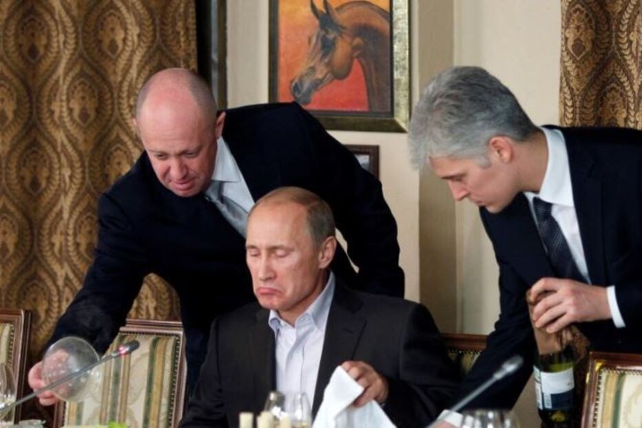 Yevgeny Prigozhin, com o Presidente russo, Vladimir Putin, num jantar