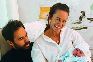 Cláudia Vieira com o companheiro, João Alves, e o pequeno Lourenço 