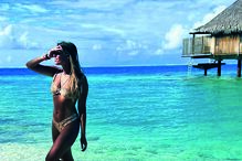 Isaurinha Jardim delicia-se com a beleza exótica de Bora Bora, no Pacífico Sul