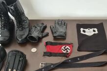 Jovem de 17 anos com cruz suástica no braço atira engenhos explosivos para interior de escola no Brasil