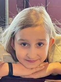 Evelyn Dieckhaus, de 9 anos, foi atingida quando tentava dar o alarme 