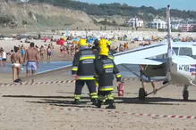 Piloto instrutor matou duas pessoas, José Lima, de 56 anos, e uma menina, de 8 anos na praia São João da Caparica