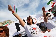 Ativistas na Europa assinalam aniversário da morte de Mahsa Amini no Irão