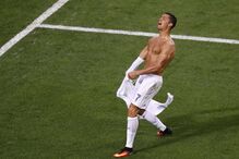 Uma imagem que se repete várias vezes: Cristiano Ronaldo festeja um golo sem camisola. Este frente ao Atlético de Madrid, na final da Champions