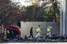 Autoridades no local após incêndio em Valência
