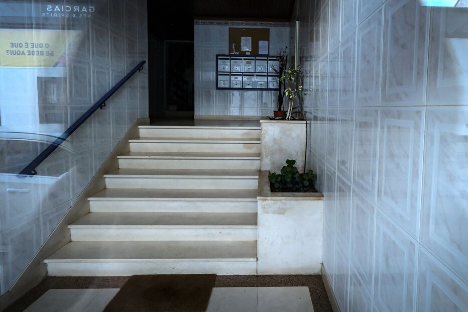 Escadas onde estava o corpo