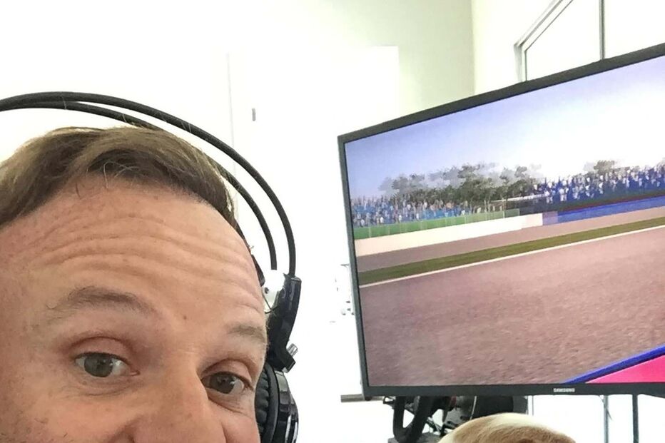 Rubens Barrichello com o cão