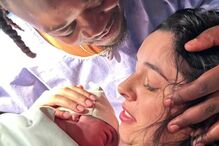 Ivandro e a namorada Joana com o filho