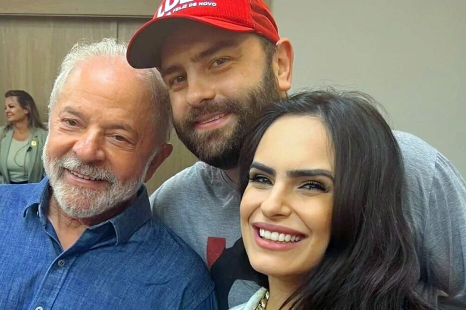 O Presidente brasileiro, Lula da Silva, com o filho, Luís Cláudio, e a namorada, Natália Schincariol