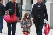 Katie Holmes e Tom Cruise com a filha