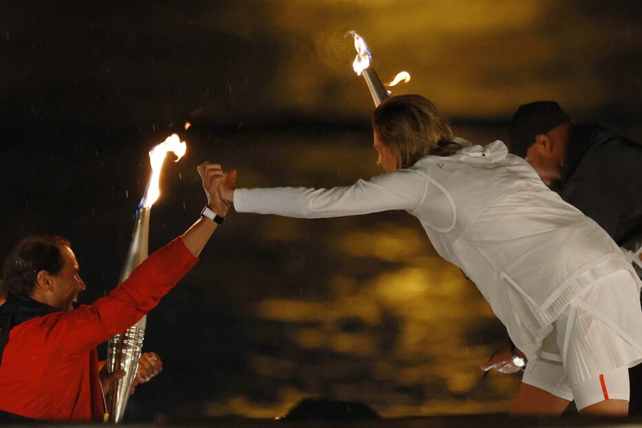 Rafael Nadal passa a chama a Amelie Mauresmo