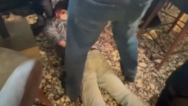 Televisão russa partilha imagens da detenção de Gershkovich e Whelan 