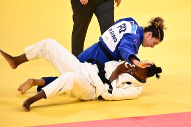 Patrícia Sampaio vence  Madeleine Malonga