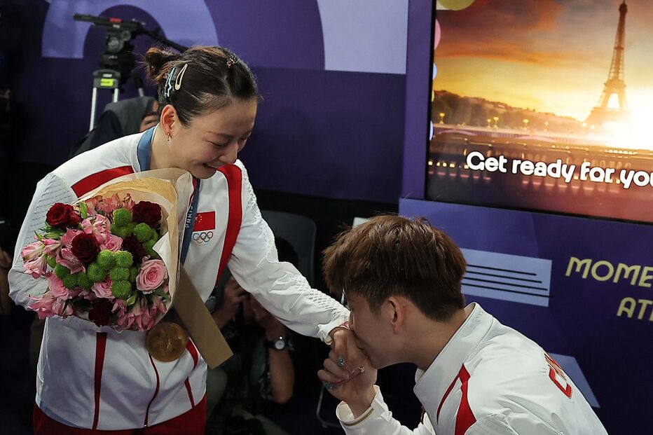 Jogadora de Badminton pedida em casamento após conquistar ouro 