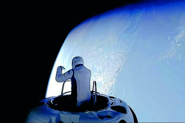 Jared isaacman debruçou-se para fora da nave para apreciar a vista da terra