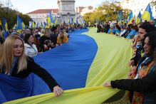 Ucranianos manifestam-se em Lisboa pela paz e com críticas a Trump