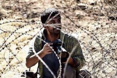 Yasin Akgul,fotógrafo da France-Presse